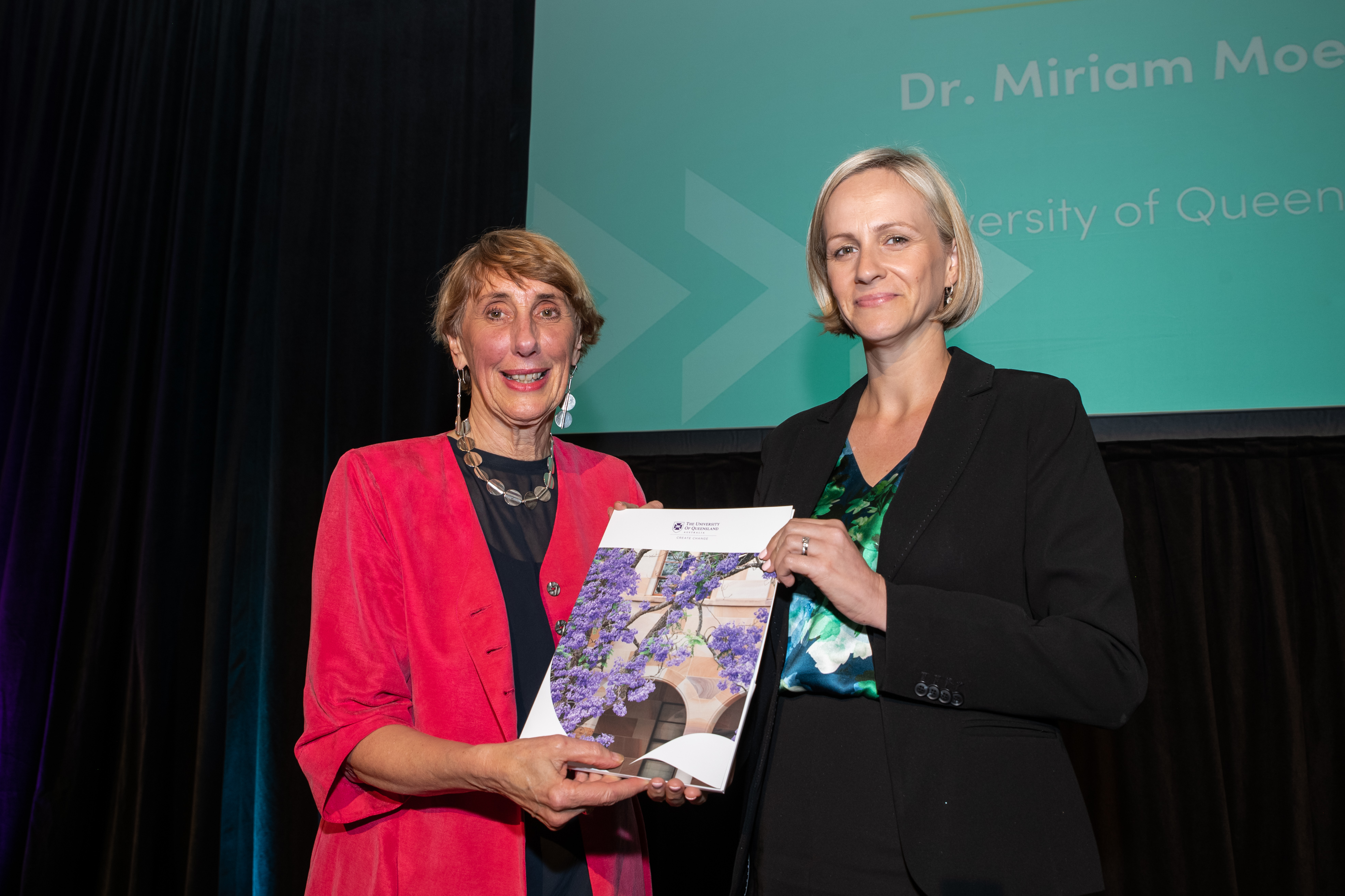 Professor Jenny Dixon, Provost of U21, presenting Dr Miriam Moeller with her award