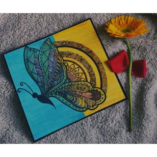 The name of my artwork is "FLY". In admist of situation like covid 19 where the world is struggling. I tried to create a bright colorful painting which radiates hope, positivity and joy. The artwork is a mandala art. The butterfly in the painting gives vibrant energy to dream. The two colors blue and yellow depicts day (happiness) and night (sorrow), the butterfly between these two colors indicates that despite whatever the situation may be I (butterfly) will fly high. The flower besides the butterfly signi