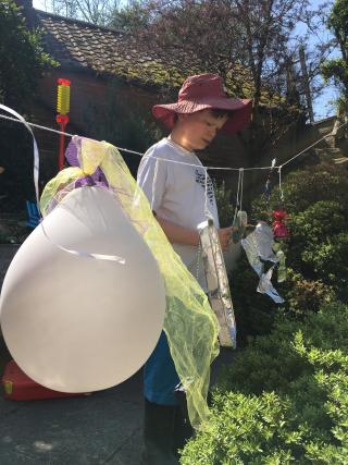 My brother inspects his sensory washing line. Joe has autism. The pandemic presents new challenges for young people with special needs. Being creative in the garden, Joe has adapted to the sudden disruptions in his routine. We are all immensely proud of him. 