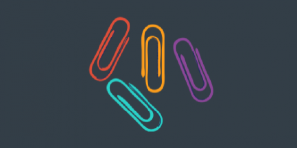 Four paperclips on a dark background