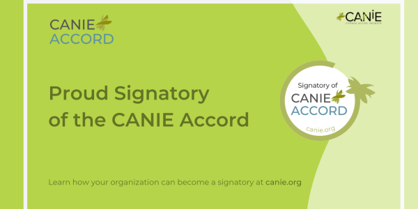 Proud Signatory of the CANIE Accord on green background with CANIE Accord logo