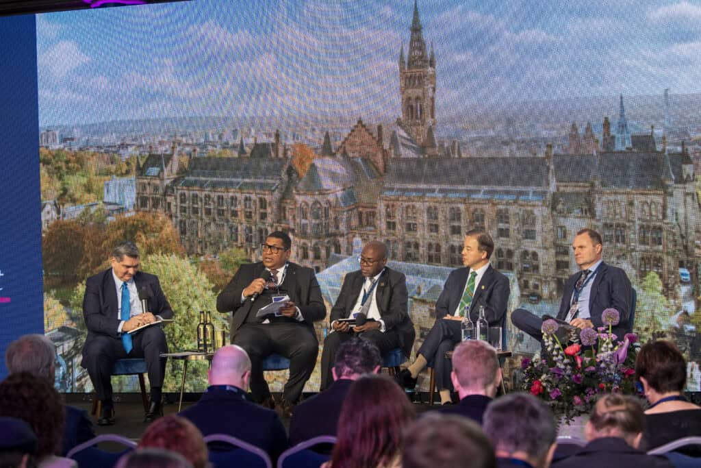Universitas 21 Presidents on Stage speaking at the Annual Network Meeting 2026